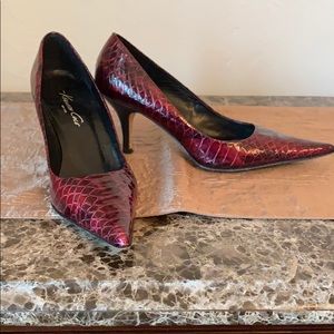Kenneth Cole red snakeskin pumps.